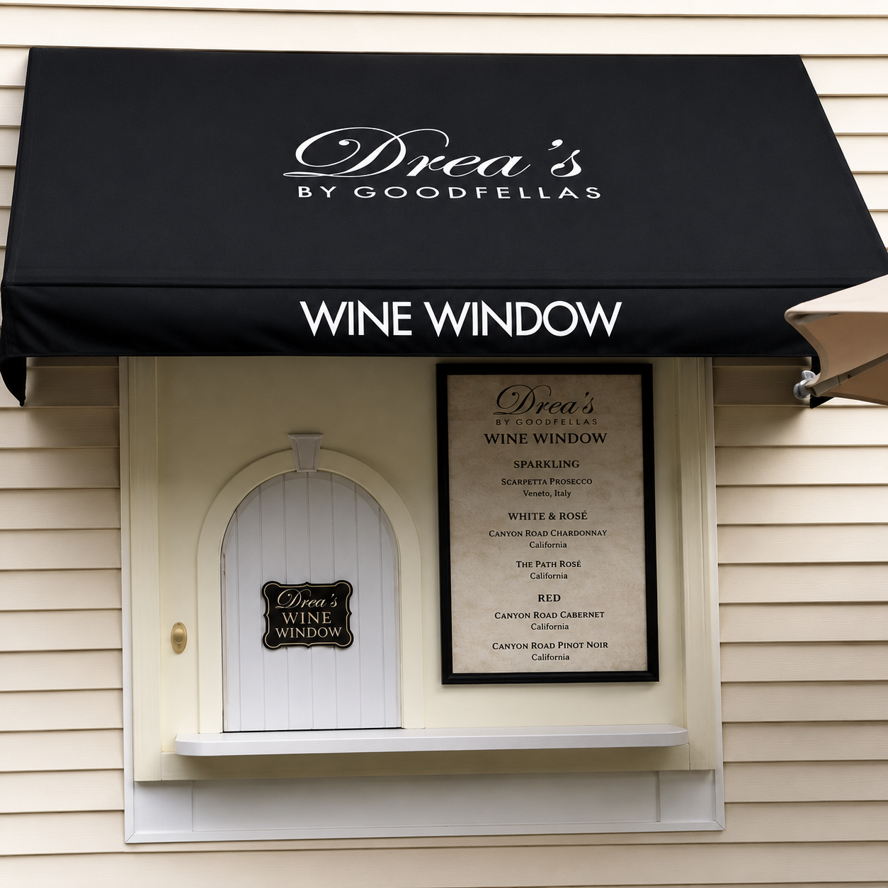 Drea's wine window, finished with awning